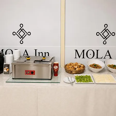 Mola * Ουσάκ
